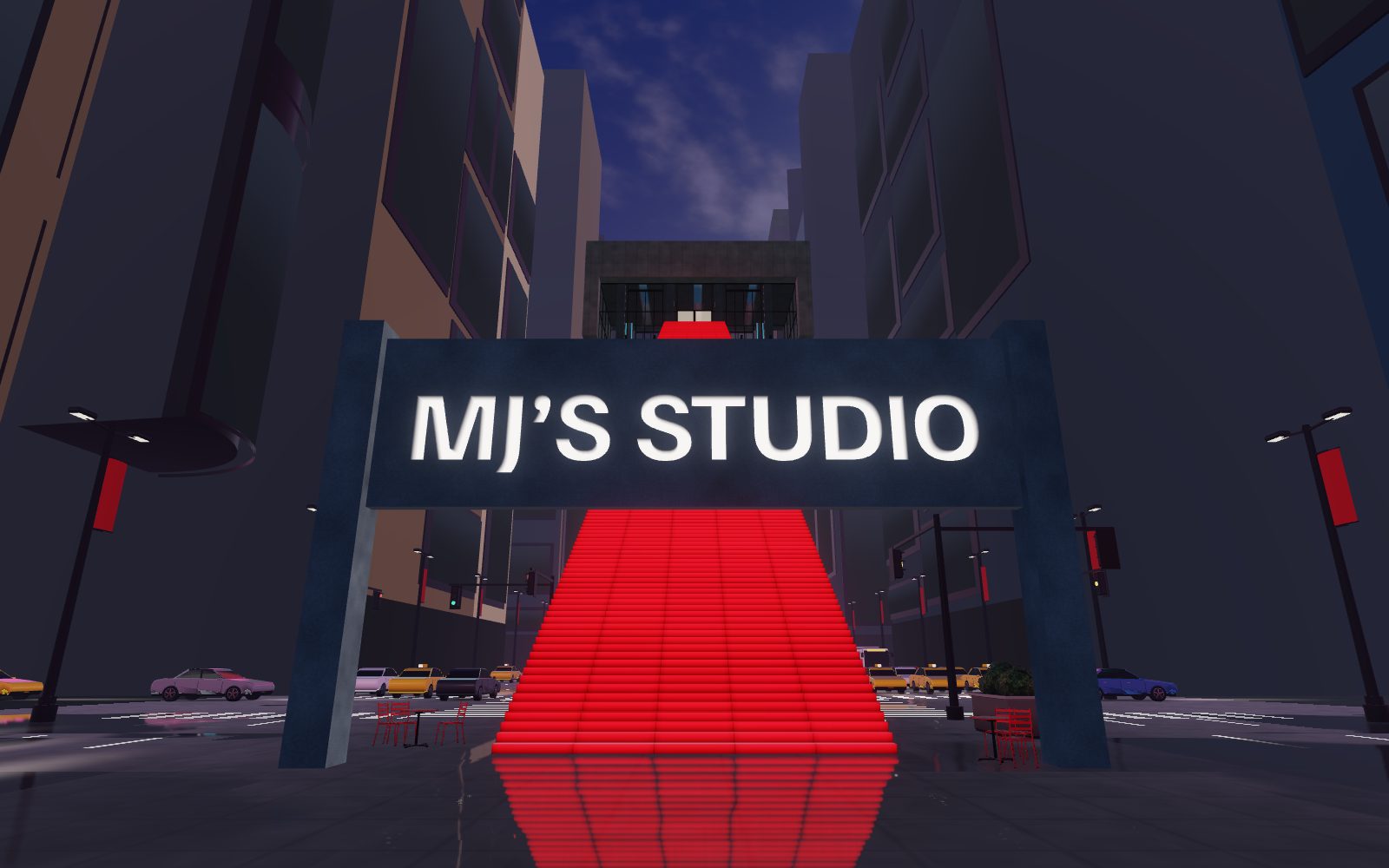 MJ’s Studio on a sign at the foot of a flight of red steps in Times Square at night, the studio’s door at the top